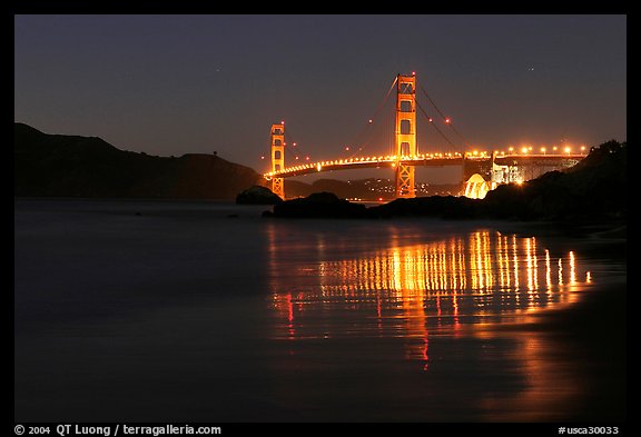 Golden Gate bridge at night from Baker Beach. San Francisco, California, USA