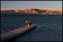 Fishing on San Luis Reservoir at sunset. California, USA