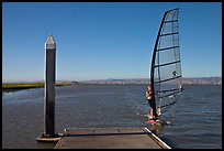 Windsurfer near deck, Palo Alto Baylands. Palo Alto,  California, USA (color)