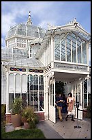 Couple exiting the Conservatory of Flowers. San Francisco, California, USA (color)