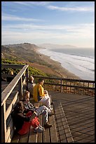 Enjoying sunset from the observation platform at Fort Funston. San Francisco, California, USA (color)