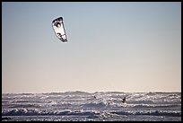 Kitesurfer in powerful waves, afternoon. San Francisco, California, USA