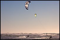 Kite surfers and Pacific Ocean waves, late afternoon. San Francisco, California, USA (color)