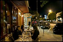 Sidewalk with Outdoor restaurant table and people walking. Burlingame,  California, USA ( color)