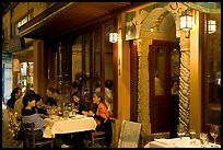 Outdoor table of Italian restaurant at night. Burlingame,  California, USA