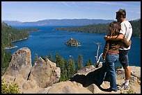 Couple standing above Emerald Bay, Lake Tahoe, California. USA (color)