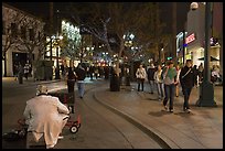 People walking past mime on Third Street Promenade. Santa Monica, Los Angeles, California, USA