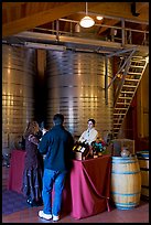 Couple tasting wine. Napa Valley, California, USA (color)