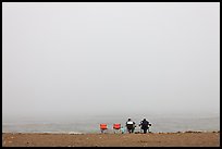 Sitting in front of foggy ocean, Manchester State Park. California, USA (color)
