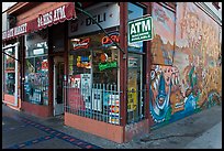 Corner store and mural, Mission District. San Francisco, California, USA (color)