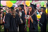 Women students with ballon, commencement. Stanford University, California, USA (color)