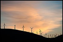 Wind farm silhouetted on hill, Altamont. California, USA ( color)