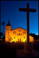 Cross and Santa Clara Mission at dusk. Santa Clara,  California, USA (color)