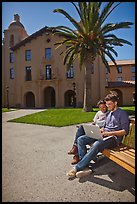 Students with laptop on bench. Stanford University, California, USA (color)