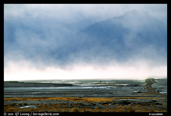 Mineral deposits of dry lake stirred up by a windstorm, Owens Valley. California, USA