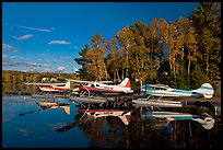 Floatplanes and reflections in Moosehead Lake  late afternoon, Greenville. Maine, USA ( color)
