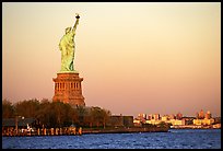 Statue of Liberty and Liberty Island from the back, sunset. NYC, New York, USA ( color)