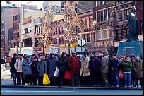 Gathering in Chinatown in winter. NYC, New York, USA