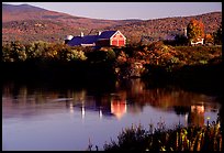 Red barns reflected in Line Pond near Pomfret. Vermont, New England, USA (color)