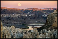 Moonrise over pinnacles and river. Upper Missouri River Breaks National Monument, Montana, USA ( color)