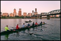 Eight-oar shell and city skyline at sunrise. Portland, Oregon, USA
