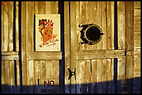 Wooden door with cuba poster. Key West, Florida, USA