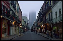 Bourbon street and the new town in the fog, French Quarter. New Orleans, Louisiana, USA ( color)