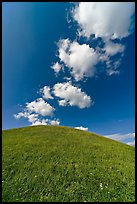 Rounded hill and clouds,  Emerald Mound. Natchez Trace Parkway, Mississippi, USA ( color)