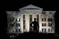 Statue of Andrew Jackson silhouetted against the City Hall at night. Jackson, Mississippi, USA (color)