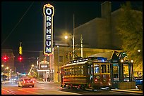 Street by night with trolley and Orpheum theater. Memphis, Tennessee, USA