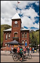 Mountain bikers in front of San Miguel County court house. Telluride, Colorado, USA