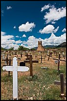Wooden crosses and old adobe church. Taos, New Mexico, USA ( color)