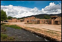 Rio Pueblo stream and pueblo village. Taos, New Mexico, USA (color)
