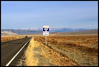 Sign reading Loneliest road in America. Nevada, USA
