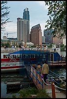 Walking into tour boat on Colorado River. Austin, Texas, USA ( color)