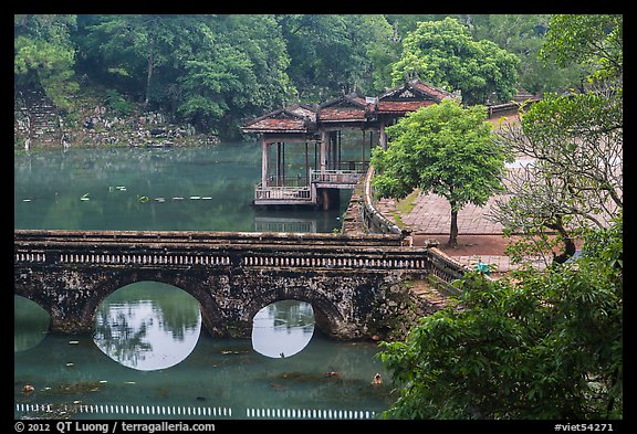 Stone bridge, pavilion, and Luu Khiem Lake, Tu Duc Tomb. Hue, Vietnam