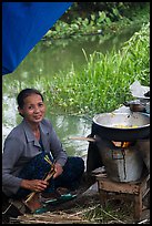 Woman cooking canalside, Thanh Toan. Hue, Vietnam ( color)