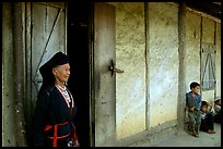 Elderly  tribewoman outside her house, near Mai Chau. Northwest Vietnam ( color)