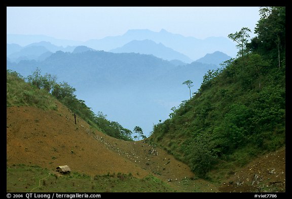 House and misty ridges between Moc Chau and Yeu Chau. Northwest Vietnam