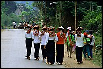 Young thai women walking on the road, between Son La and Tuan Chau. Northwest Vietnam ( color)