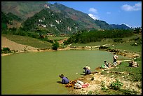 Thai women on the shores of a pond, near Tuan Giao. Northwest Vietnam