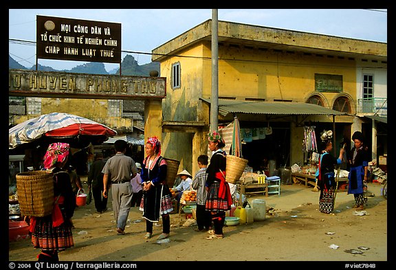 Hmong women near the entrance of the market, Tam Duong. Northwest Vietnam (color)
