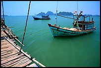Fishing boats in the China sea. Hong Chong Peninsula, Vietnam (color)