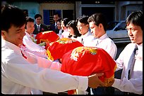 Gifts are exchanged in front of the bride's home. Ho Chi Minh City, Vietnam