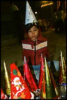 Child on Christmas night. Ho Chi Minh City, Vietnam (color)