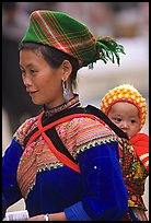 Young Flower Hmong woman and baby. Bac Ha, Vietnam (color)
