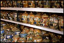 Cremation is popular. Ashes are collected in individual funeral urns. Ho Chi Minh City, Vietnam (color)