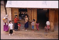 Gathering at the village store, in a minority village. Da Lat, Vietnam (color)