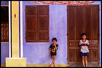 Children in front of old house, Hoi An. Hoi An, Vietnam ( color)