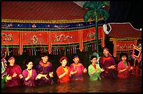 Artists salute after a water puppets performance in 1999. Hanoi, Vietnam (color)